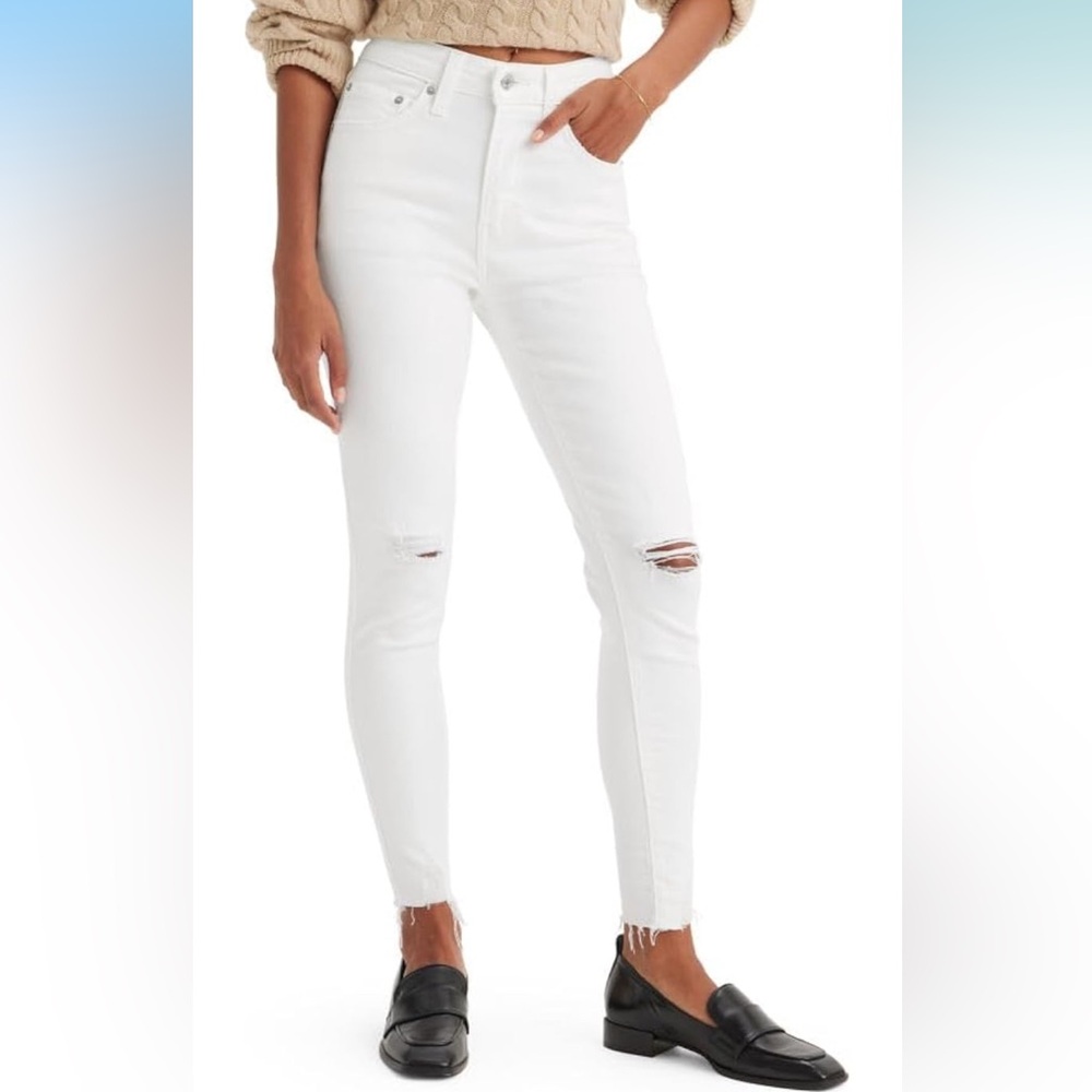 American Eagle Women's White high rise super stretch Distressed jegging